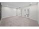 Large bedroom with double doors leading to closet and bath at 2728 Sunrise Landing Ln, Lakeland, FL 33812