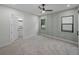 Spacious bedroom with ceiling fan and an ensuite bathroom at 2728 Sunrise Landing Ln, Lakeland, FL 33812