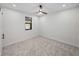 Spacious bedroom with carpeted floor and ceiling fan at 2728 Sunrise Landing Ln, Lakeland, FL 33812