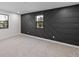 Spacious bedroom with a dramatic dark accent wall at 2728 Sunrise Landing Ln, Lakeland, FL 33812