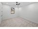 Bright bedroom with carpeted floor and ceiling fan at 2728 Sunrise Landing Ln, Lakeland, FL 33812
