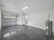 Finished two-car garage with epoxy flooring at 2728 Sunrise Landing Ln, Lakeland, FL 33812