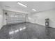 Spacious two-car garage with epoxy flooring at 2728 Sunrise Landing Ln, Lakeland, FL 33812