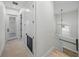 Bright hallway with access to bathroom and upstairs at 2728 Sunrise Landing Ln, Lakeland, FL 33812