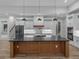 Modern kitchen with large island and stainless steel appliances at 2728 Sunrise Landing Ln, Lakeland, FL 33812