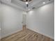 Light-filled office features wood-look floors and access to another room at 2728 Sunrise Landing Ln, Lakeland, FL 33812