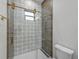 Updated shower with glass enclosure and modern tile at 2728 Sunrise Landing Ln, Lakeland, FL 33812