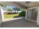 View of backyard from covered patio with sliding glass doors at 3164 Stonewater Dr # 3164, Lakeland, FL 33803
