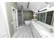 Bathroom features a double vanity, large shower, and a free-standing tub at 3164 Stonewater Dr # 3164, Lakeland, FL 33803