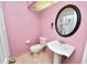 Small bathroom with pedestal sink and toilet at 3164 Stonewater Dr # 3164, Lakeland, FL 33803