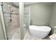 Spa-like bathroom with walk-in shower and soaking tub at 3164 Stonewater Dr # 3164, Lakeland, FL 33803