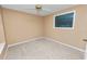 Bright bedroom with ceiling fan and window at 3164 Stonewater Dr # 3164, Lakeland, FL 33803