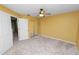 Comfortable bedroom with ceiling fan and mirrored closet doors at 3164 Stonewater Dr # 3164, Lakeland, FL 33803