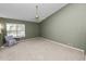 Spacious bedroom with vaulted ceiling and carpeted floors at 3164 Stonewater Dr # 3164, Lakeland, FL 33803