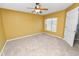 Well-lit bedroom with ceiling fan and window coverings at 3164 Stonewater Dr # 3164, Lakeland, FL 33803