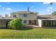 Rear view of house showing exterior and patio at 3164 Stonewater Dr # 3164, Lakeland, FL 33803