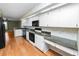 Kitchen features granite countertops and modern appliances at 3164 Stonewater Dr # 3164, Lakeland, FL 33803