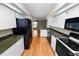 Modern kitchen with granite countertops and black appliances at 3164 Stonewater Dr # 3164, Lakeland, FL 33803