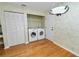 Laundry closet with washer, dryer, and ample storage space at 3164 Stonewater Dr # 3164, Lakeland, FL 33803