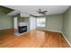 Spacious living room with a fireplace and hardwood floors at 3164 Stonewater Dr # 3164, Lakeland, FL 33803