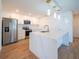 Modern kitchen with stainless steel appliances and white cabinetry at 4814 S Dossey Rd, Lakeland, FL 33811