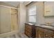 Bathroom with shower stall and updated vanity at 4903 Deerwood Dr, Lakeland, FL 33810