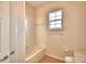 Clean bathroom with tub shower and single vanity at 5635 Canvasback Ct, Lakeland, FL 33805
