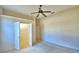 Bright bedroom with ceiling fan and spacious closet at 5635 Canvasback Ct, Lakeland, FL 33805