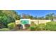 Deeson by the Lake community entrance sign with landscaping at 5635 Canvasback Ct, Lakeland, FL 33805