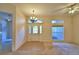 Bright entryway with tile flooring and large windows at 5635 Canvasback Ct, Lakeland, FL 33805