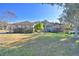 Single-story house with a well-maintained lawn and landscaping at 5635 Canvasback Ct, Lakeland, FL 33805