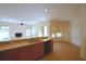 Kitchen with island, tile floor, and window seat at 5635 Canvasback Ct, Lakeland, FL 33805