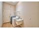 Laundry room with washer, dryer, and utility sink at 5635 Canvasback Ct, Lakeland, FL 33805