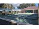 Community shuffleboard courts with covered seating at 1610 Reynolds Rd # 211, Lakeland, FL 33801