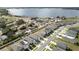 An aerial view of a residential neighborhood near a lake at 1754 Eagle Hammock Blvd, Eagle Lake, FL 33839