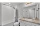 Clean and bright guest bathroom featuring a shower/tub combo and vanity at 1968 Harvest Landing Cir, Lakeland, FL 33810