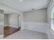 Dining area adjacent to the kitchen with tile floors and an arched doorway at 217 W Lake Ave, Auburndale, FL 33823