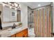 Guest bathroom with a tub/shower combo and granite countertop at 4617 S Devon Ave, Lakeland, FL 33813