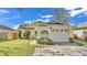 Charming single-story home with attached garage and landscaped front yard at 4617 S Devon Ave, Lakeland, FL 33813
