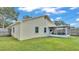 Charming single-story home with a screened porch and fenced backyard at 4617 S Devon Ave, Lakeland, FL 33813