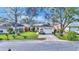 Attractive curb appeal with a paved driveway and attached garage at 4617 S Devon Ave, Lakeland, FL 33813