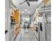 Modern kitchen with stainless steel appliances, wood cabinets, and breakfast nook at 4617 S Devon Ave, Lakeland, FL 33813