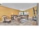 Open and airy living space with comfortable sectional sofa and stylish decor at 4617 S Devon Ave, Lakeland, FL 33813