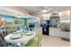 Open concept kitchen with breakfast bar and living room access at 535 Narrow Pond Rd, Polk City, FL 33868