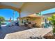Relaxing outdoor patio area with seating and lake view at 535 Narrow Pond Rd, Polk City, FL 33868