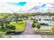 An aerial view of a community with lush green grass, trees, and homes at 540 Kelsey St, Lakeland, FL 33803