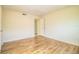 Empty bedroom with wood-look flooring, ready for personal touches at 540 Kelsey St, Lakeland, FL 33803