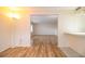 Open living area with wood-look flooring and an adjacent dining/eating area at 540 Kelsey St, Lakeland, FL 33803
