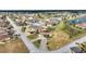 An aerial view showcasing the home's location within a waterfront community at 561 Meandering Way, Polk City, FL 33868