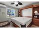 Bedroom showcasing a pull-down murphy bed, ideal for flexible space at 561 Meandering Way, Polk City, FL 33868